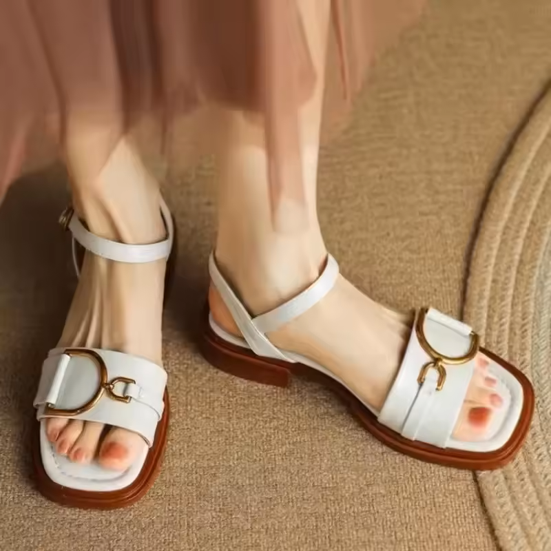 Aria Sandali piatti con fibbia