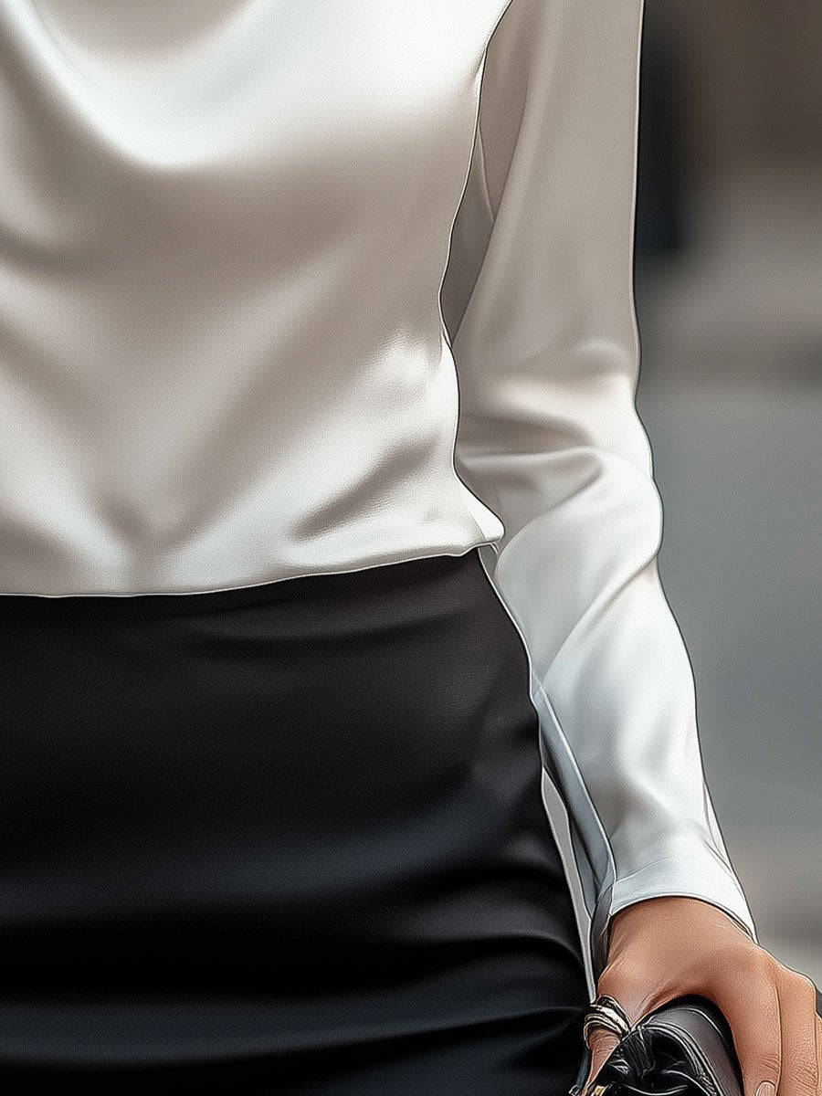 Camicetta elegante in raso con scollo a drappeggio